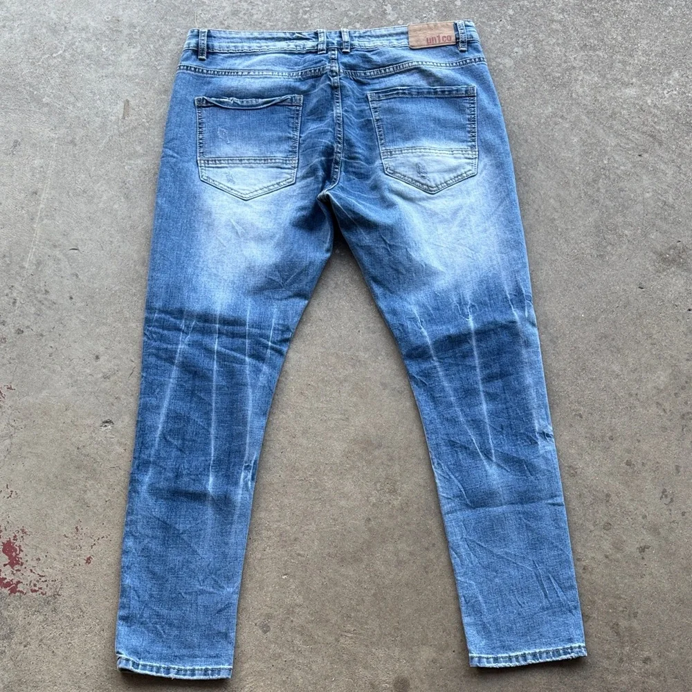 Un1co Light Blue Distressed Jeans Size 40 In style
